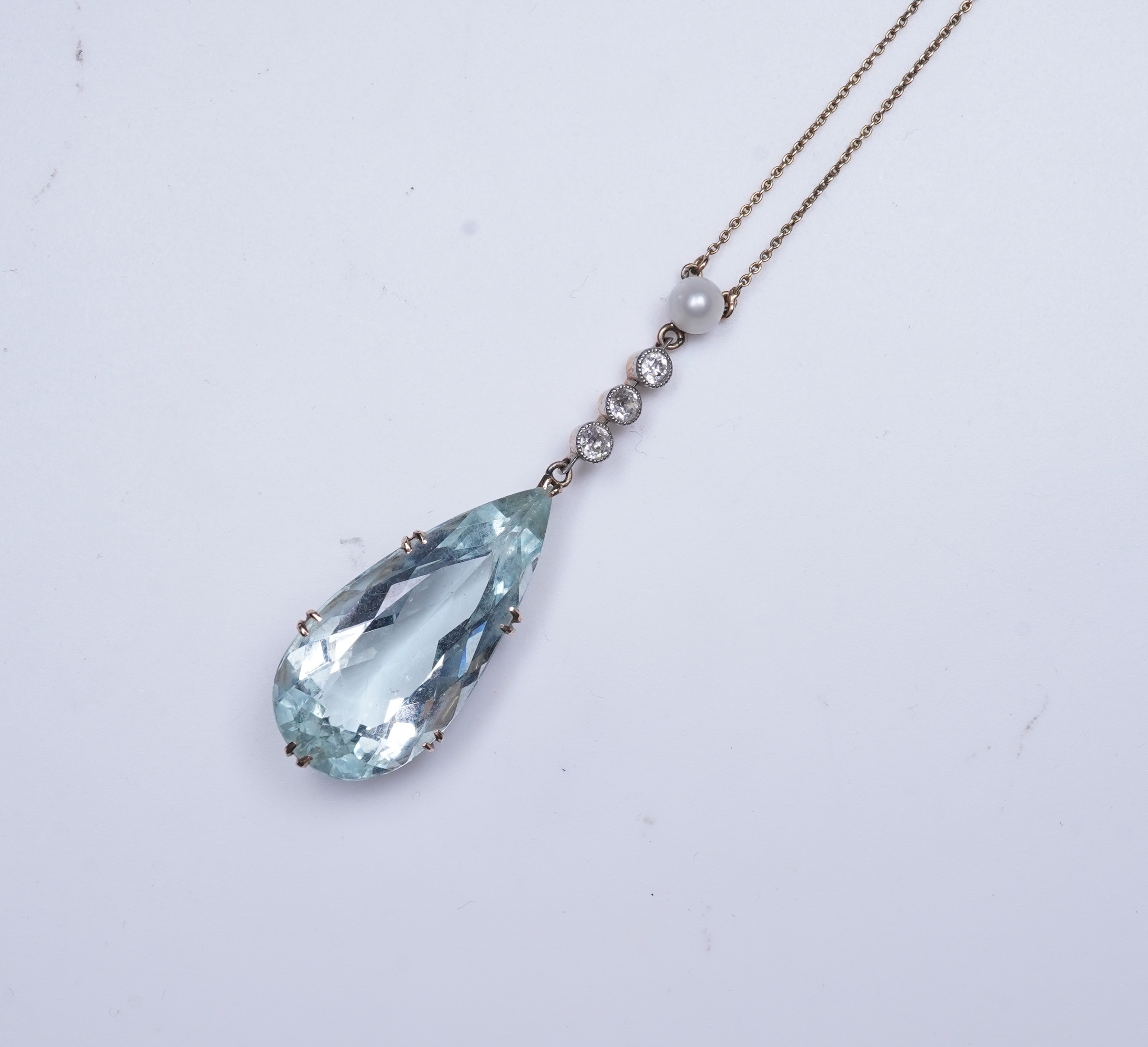 An Edwardian aquamarine, pearl and diamond pendant, early 20th century